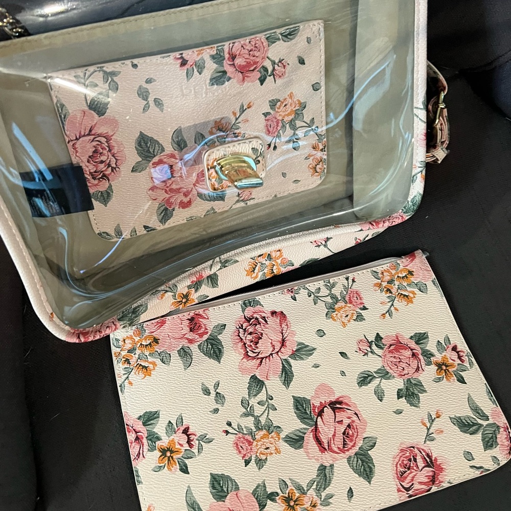 Bebe flowered hand bag never used
